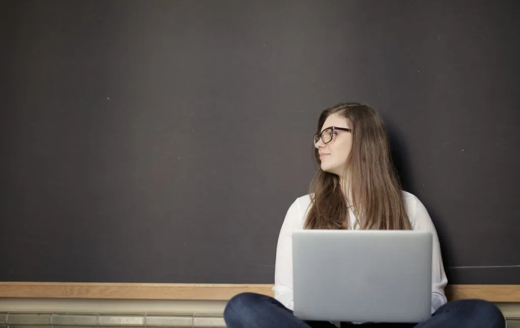 girl sitting with laptop